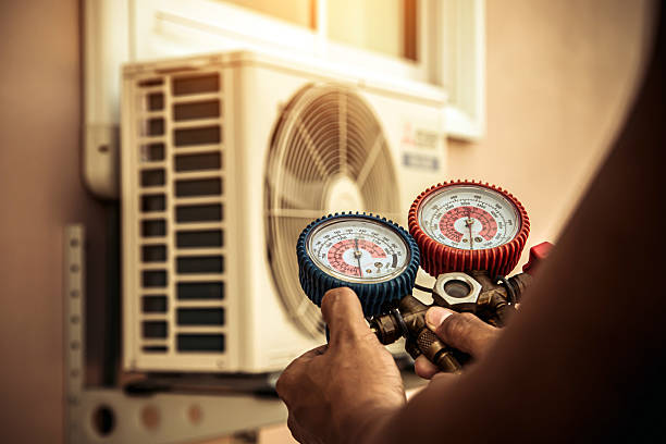 Professional Ac Installation technician working in Edwardsville, KS